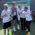 Imágenes de la participación de residentes de Llars Aspanias en la carrera, junto a Álex Roca.